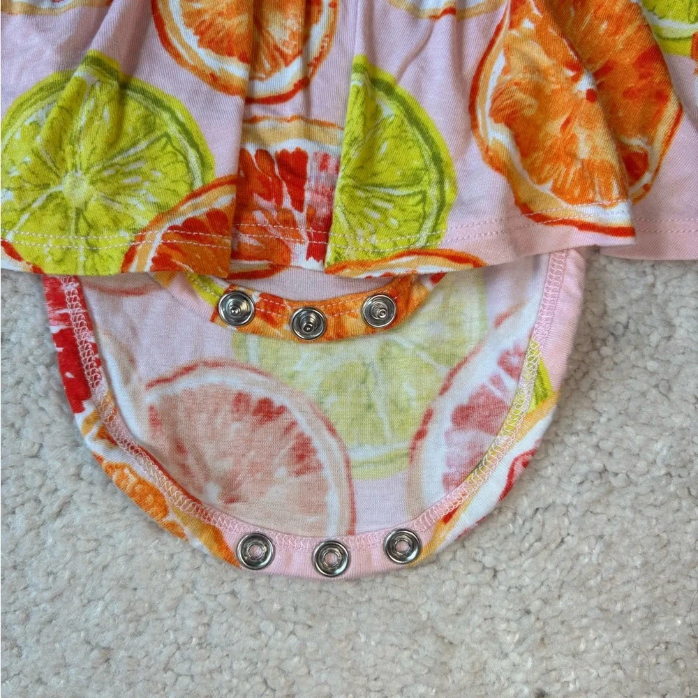 Posh Peanut Flutter Sleeve Twirl Bodysuit in a Citrus print - Picture 5 of 7